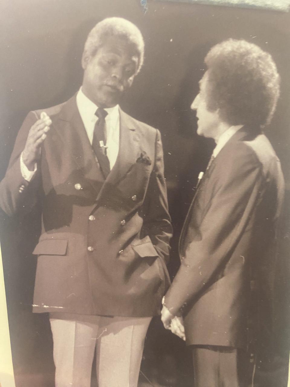 Former CBN "700 Club" Ben Kinchlow, left, and Rev. David Lombardi are shown in this file photo taken at Trinity Gospel Temple in Canton.