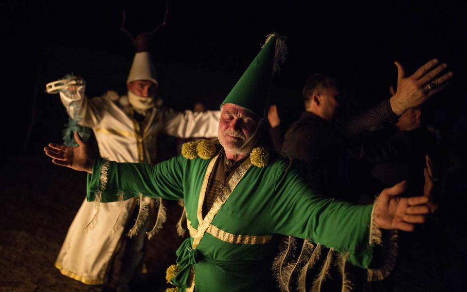 <p>A man dressed up as the Green Kosa, who is believed to prevent famine and unhappiness and bring plentifulness and happiness for the whole year, performs during the Nowruz in Igdir, Turkey.</p>