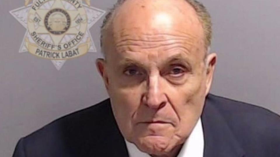 Rudy Giuliani turned himself in to Fulton County officials on 23 August, 2023 (Reuters)