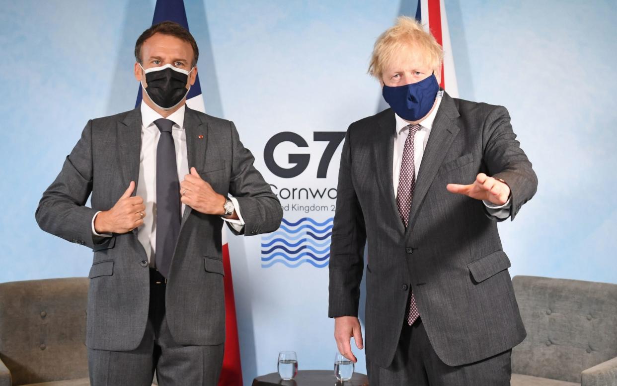 Prime Minister Boris Johnson (right) and French President Emmanuel Macron, ahead of a bilateral meeting during the G7 summit in Cornwall - PA