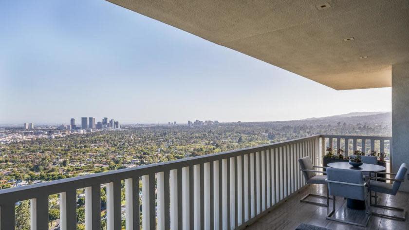 The West Hollywood condominium was recently updated and features floor-to-ceiling windows, a screening room and a modern kitchen.