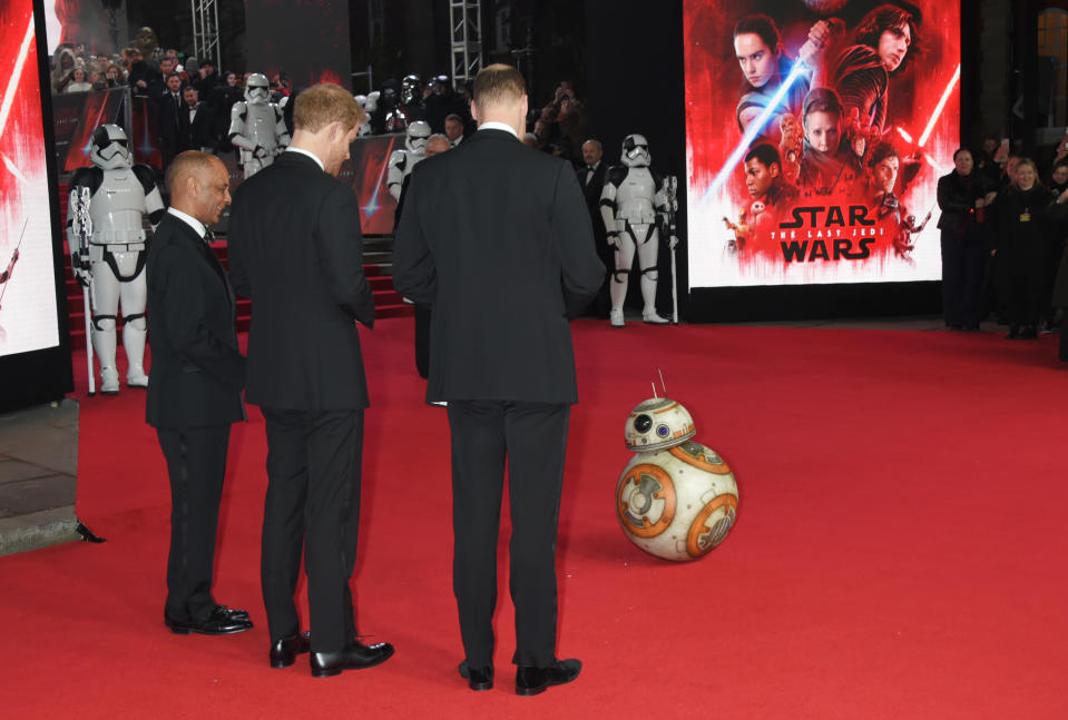 Prince William, Duke of Cambridge, and Prince Harry meet BB-8 at the European Premiere of