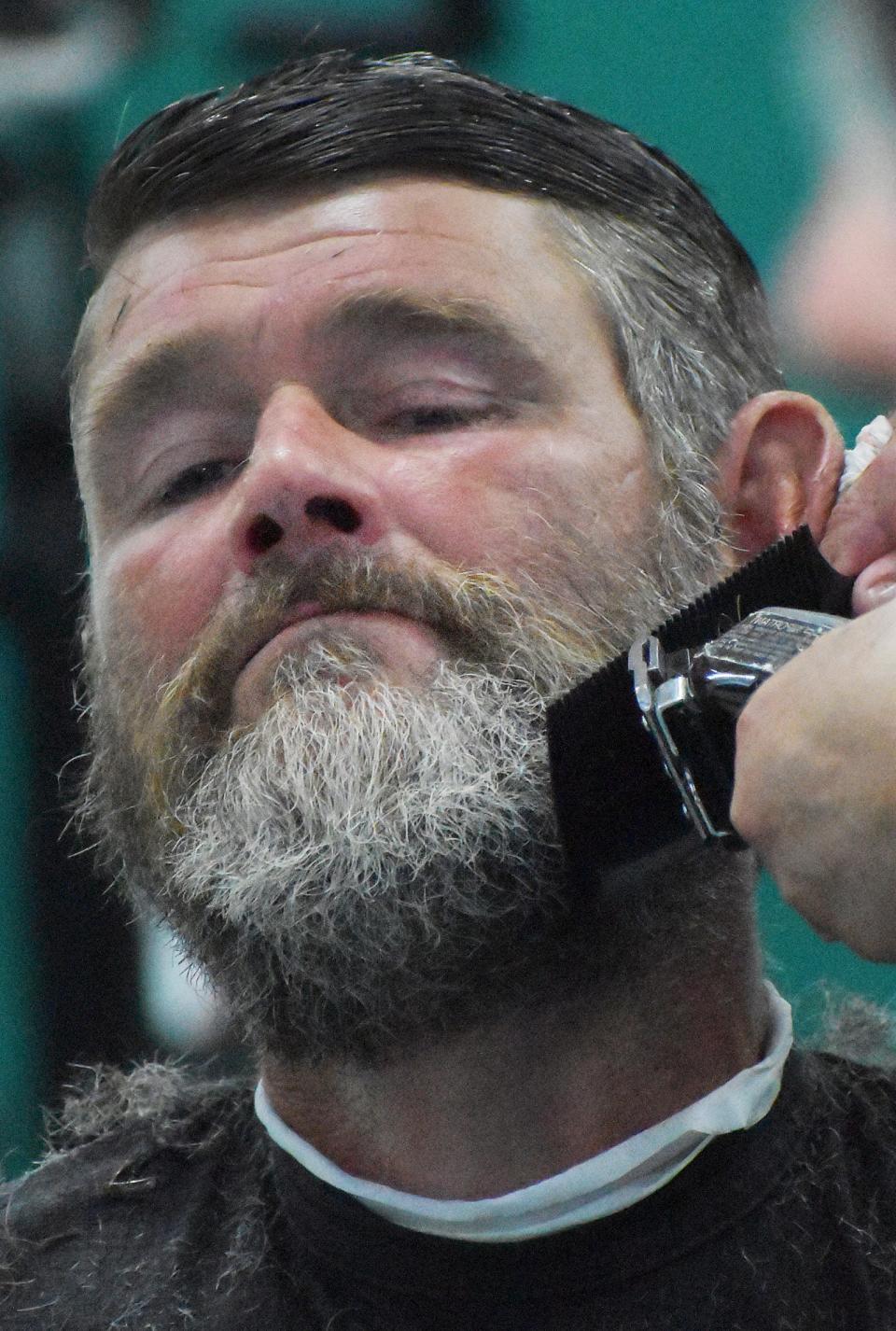 Joseph Trefful gets his beard trimmed at the Greater Fall River YMCA Thursday, April 27.