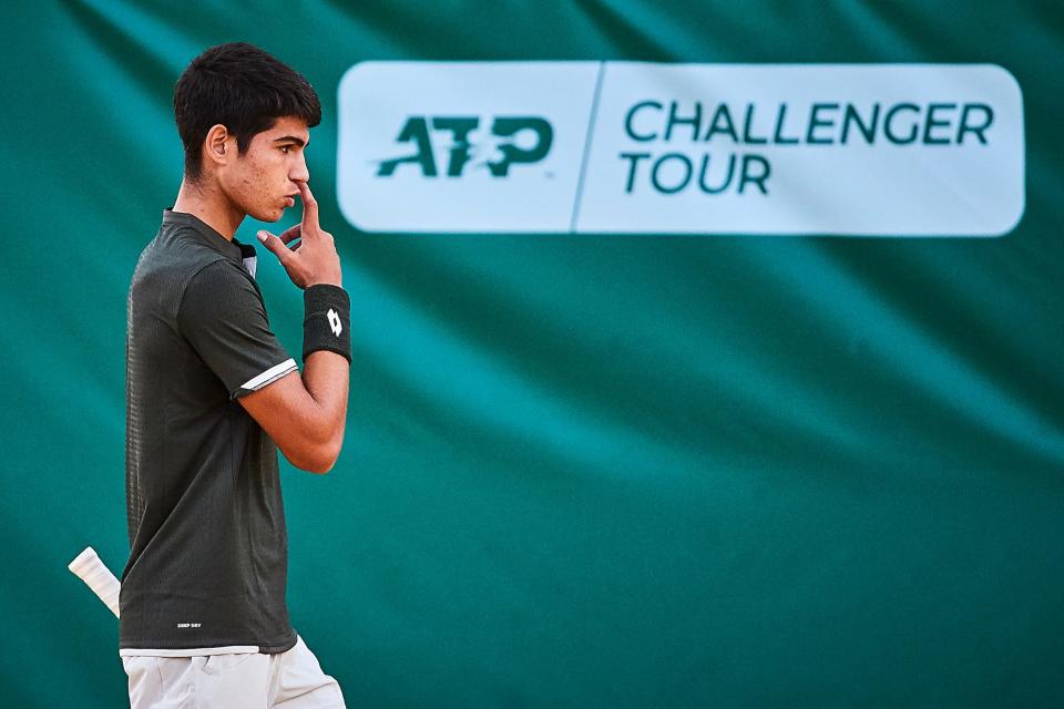 Carlos Alcaraz of Spain looks on during his Mens round of 32 match against Rio Noguchi of Japan on day two of the ATP Sevilla Chalenger at Real Club Tenis Betis