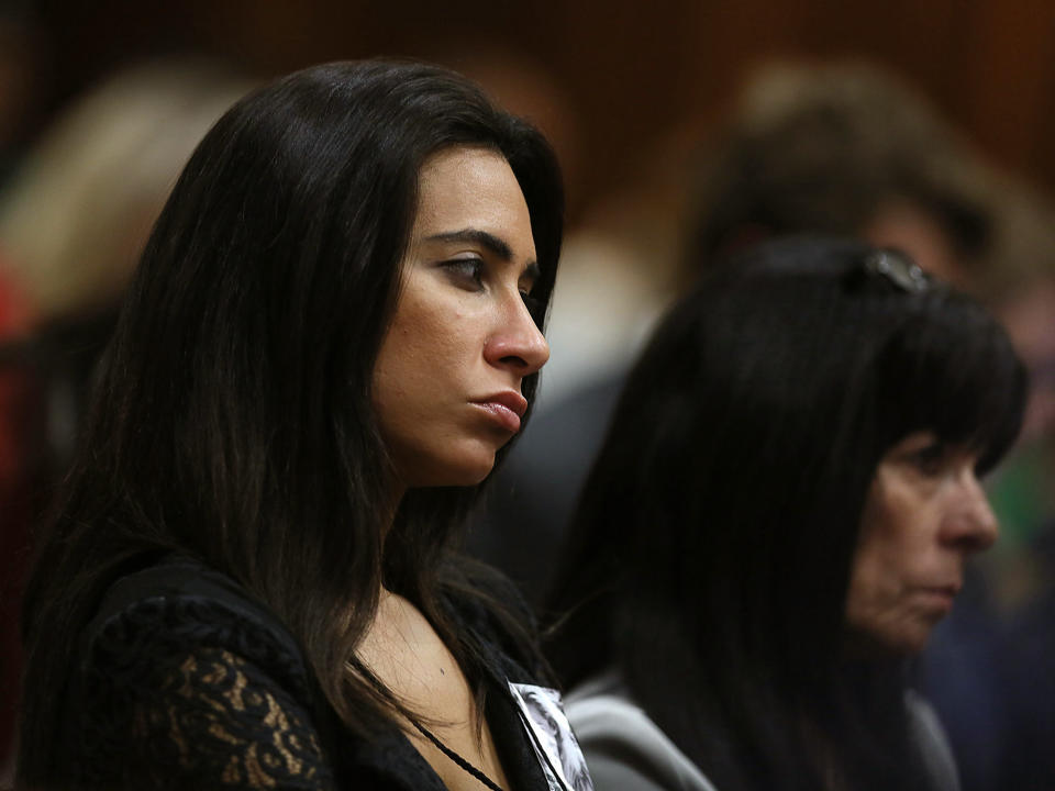 Friend of the late Reeva Steenkamp, Kim Myers, listens to a witness giving evidence during the murder trial of Oscar Pistorius, in Pretoria, South Africa, Tuesday May 6, 2014 Pistorius is charged with the shooting death of his girlfriend Reeva Steenkamp on Valentine's Day in 2013. (AP Photo. (AP Photo/Alon Skuy, Pool)
