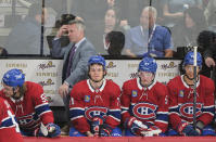 Montreal Canadiens coach Martin St. Louis stands behind the bench during the third period of the team's NHL hockey game against the Carolina Panthers on Thursday, March 30, 2023, in Montreal. (Graham Hughes/The Canadian Press via AP)