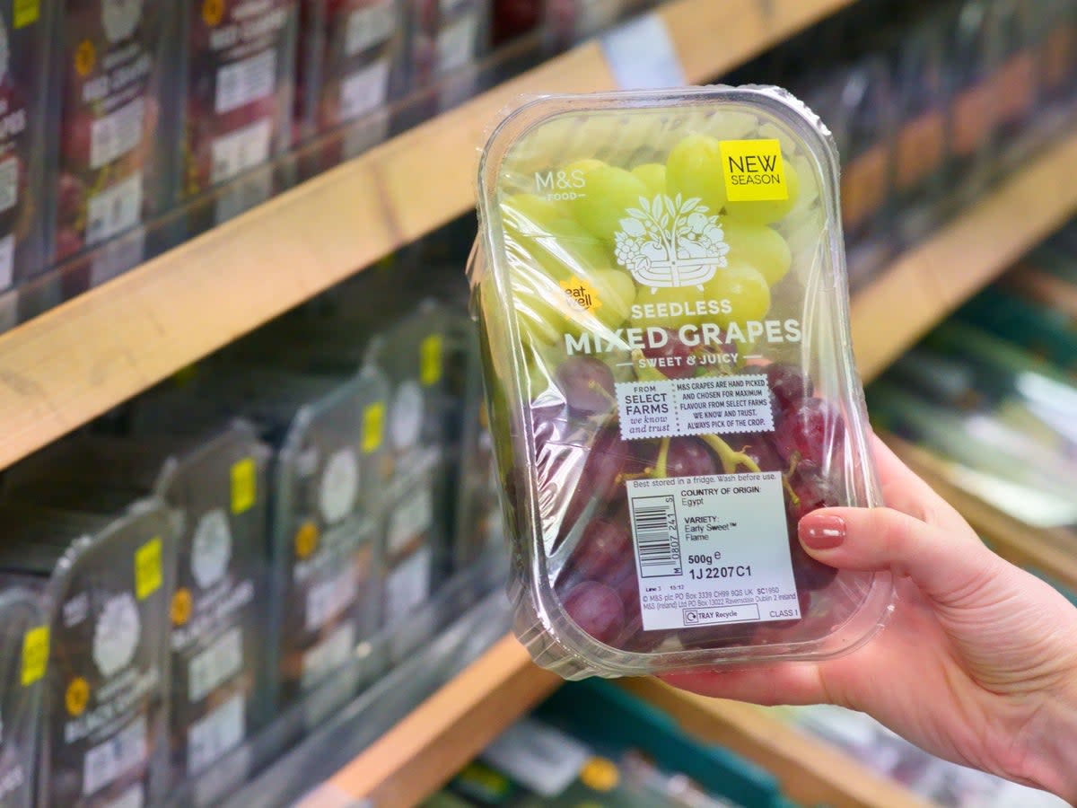 A tub of grapes from Marks and Spencer with the best before date removed. Marks and Spencer will remove best before dates from more than 300 fruit and vegetable products in a bid to reduce food waste (PA)