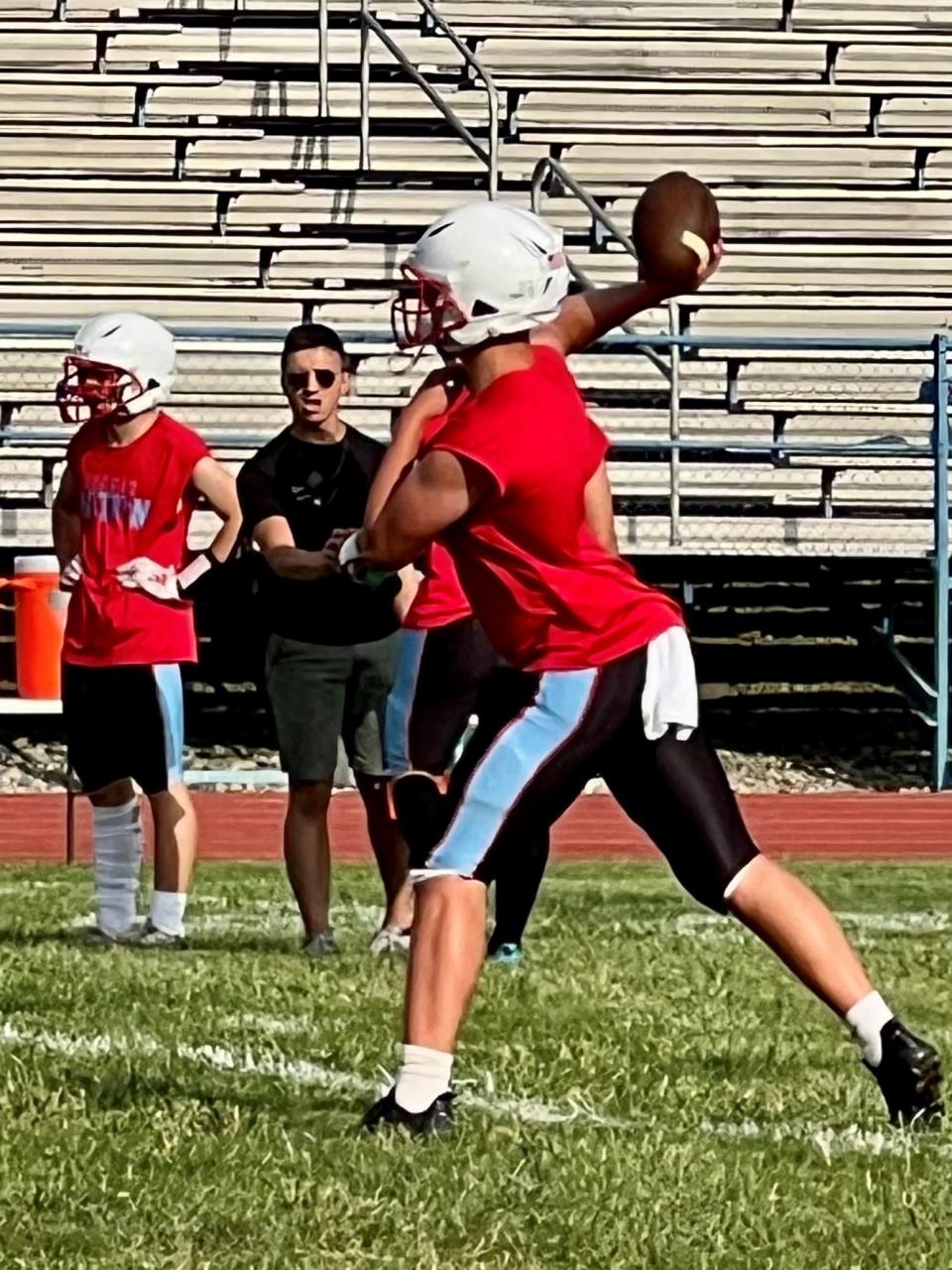 Ridgedale quarterback Brayden Townsend warms up before playing Elgin at home earlier this season.