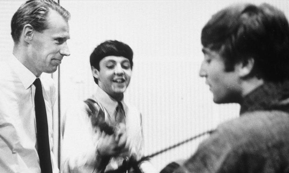 George Martin in the studio with Paul McCartney and John Lennon in 1964. By 1968’s White Album, the relationship had deteriorated, says a new biography.