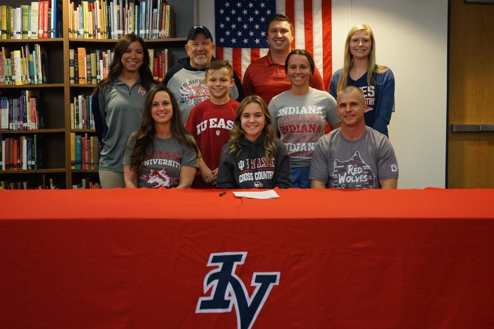 Indian Valley senior Rylee Raymond, front center, will run cross country and track at Indiana University East in Richmond, Ind. Raymond is joined in the front row by her parents, Laura and Eric; brother Brodie and sister Lincoln in the middle, and coaches Madison Noris, Jim Krocker, Bill Palma and Jessica Sucheck. She plans to study Exercise Science. Raymond was first team Inter-Valley Conference and a state qualifier in cross country. She was selected the Braves Most Valuable Runner, was a four-year letter winner and selected for Academic All Ohio.