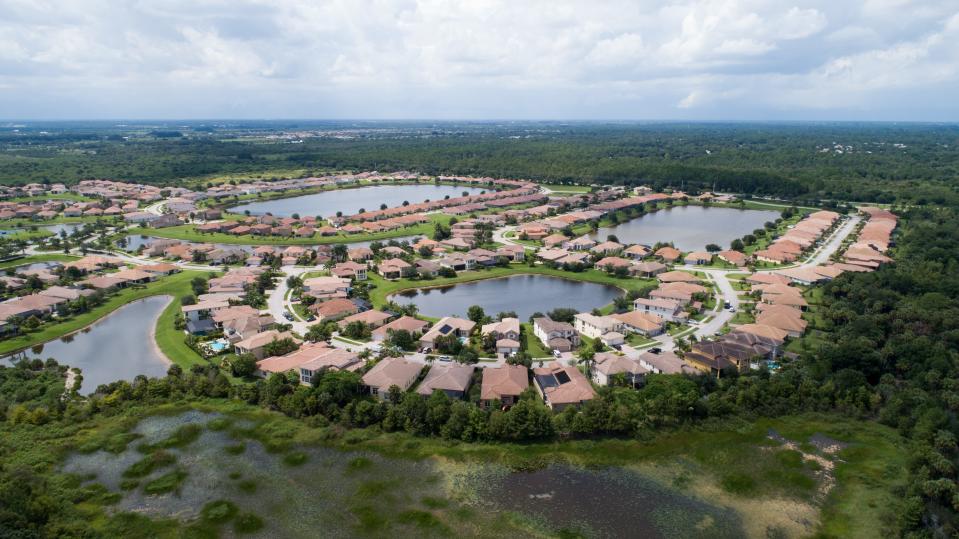 Millstone Landing, located across from the less developed fellow D.R. Horton development Millstone South, is seen in a drone aerial photo Aug. 13, 2019, in Indian River County. 