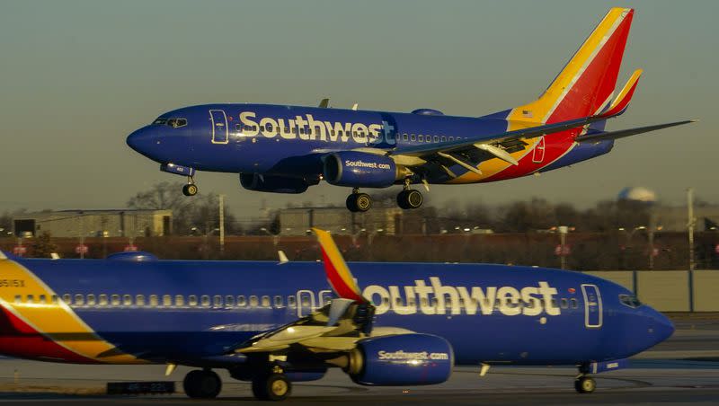 A Southwest Airlines plane prepares to land at Midway International Airport, Feb. 12, 2023, in Chicago. A report indicates 69% of flights left on time in December in the U.S..