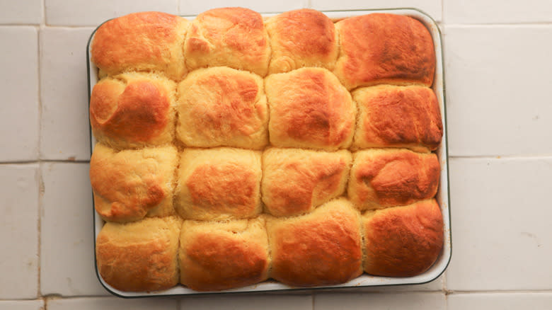 Tray of baked pumpkin rolls