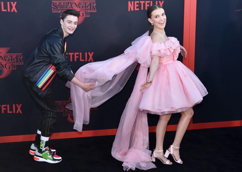 Millie Bobbie Brown and US actor Noah Schnapp attend Netflix's "Stranger Things 3" premiere