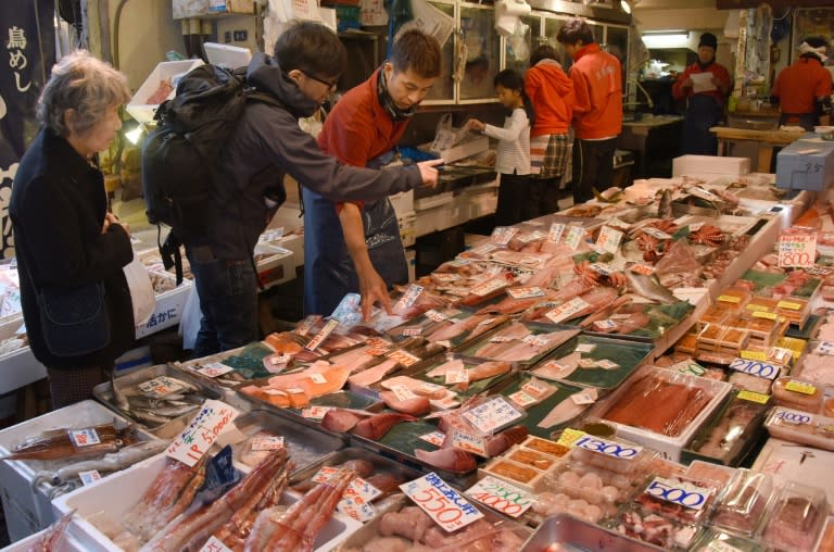 The Japanese government says spending by households across the country in June fell 2.2 percent from a year earlier