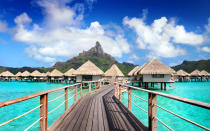 <p>Home to the Bora Bora turtle center, <a rel="nofollow noopener" href="http://www.lemeridien-borabora.com/" target="_blank" data-ylk="slk:Le Méridien Bora Bora;elm:context_link;itc:0;sec:content-canvas" class="link ">Le Méridien Bora Bora</a> offers Polynesian-style overwater bungalows with local handicrafts set on a private lagoon. Don't miss a <a rel="nofollow noopener" href="http://www.travelandleisure.com/slideshows/the-worlds-most-romantic-places-to-propose/5" target="_blank" data-ylk="slk:romantic, sunset boat ride;elm:context_link;itc:0;sec:content-canvas" class="link ">romantic, sunset boat ride</a> in one of the resort's traditional <em>pirogues</em>. </p>