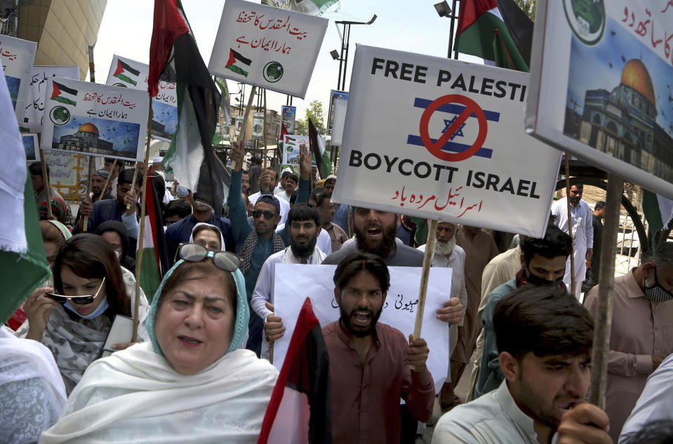 Supporters of the Pakistan Muslim League-N party take part in a rally in support of Palestinians, in Peshawar, Pakistan, Tuesday, May 18, 2021. (AP Photo/Muhammad Sajjad)