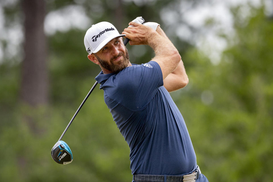 Dustin Johnson watches his drive off the third tee during the final round of the Palmetto Championship golf tournament in Ridgeland, S.C., Sunday, June 13, 2021. (AP Photo/Stephen B. Morton)