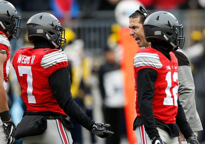 Defense coach Luke Fickell yells at Ohio State Buckeyes safety Damon Webb (7) after a scuffle following a Michigan Wolverines touchdown during the second quarter of the NCAA football game between the Ohio State Buckeyes and the Michigan Wolverines at Ohio Stadium on Saturday, November 26, 2016.