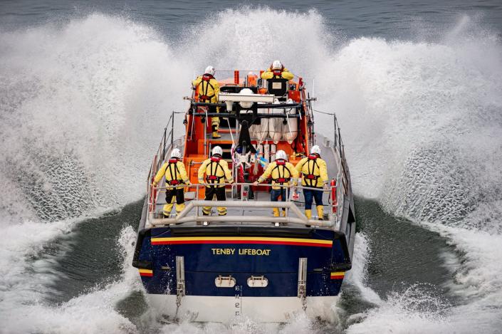 Photographer Adam Jones captured impressive images of the Tenby Lifeboat launching on a training run (Adam Jones/SWNS)