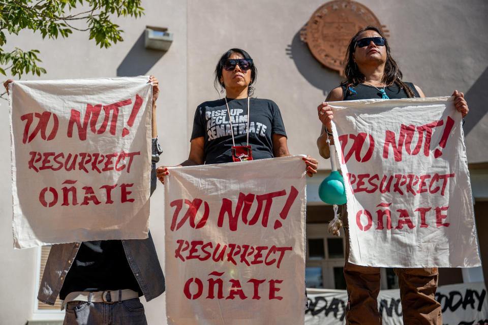 Demonstrators protest the reinstallation of a 16th-century New Mexico conquistador statue at the Rio Arriba County building on Sept. 28, 2023 in Espanola, N.M. (Brandon Bell / Getty Images)