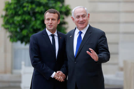 French President Emmanuel Macron escorts Israeli Prime Minister Benjamin Netanyahu after their meeting at the Elysee Palace in Paris, France, July 16, 2017. REUTERS/Stephane Mahe