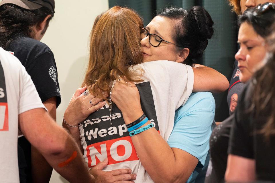 Velma Lisa Duran gets a hug from Patricia Oliver as families hurt by school shootings called for gun reforms at the Capitol.