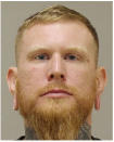 In a photo provided by the Kent County Sheriff, Brandon Caserta is shown in a booking photo. Caserta is one of several people charged with plotting to kidnap Michigan Democratic Gov. Gretchen Whitmer, authorities said Thursday, Oct. 8, 2020, in announcing charges in an alleged scheme that involved months of planning and even rehearsals to snatch Whitmer from her vacation home. (Kent County Sheriff via AP)