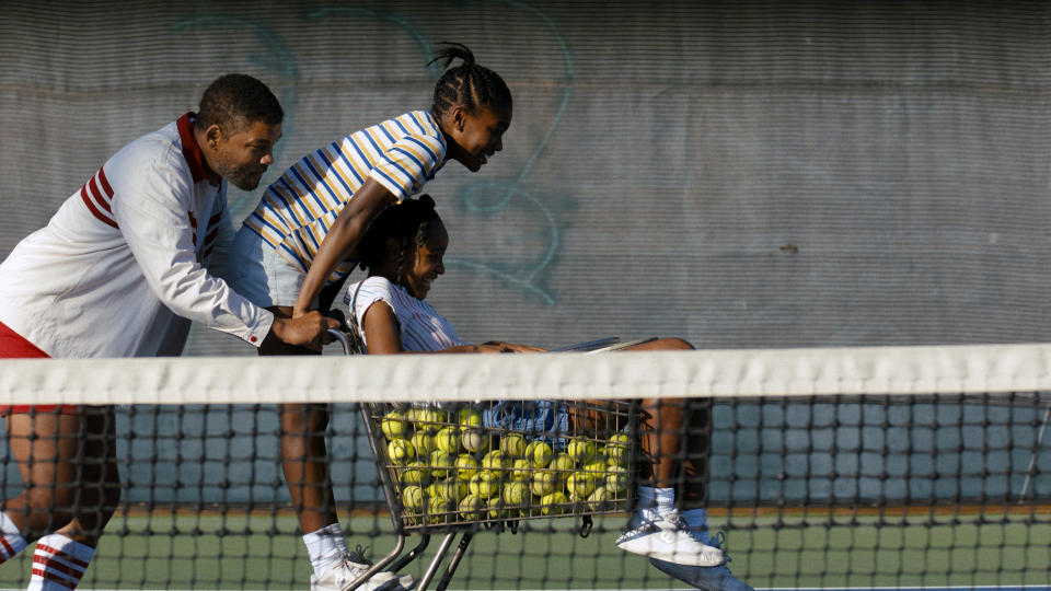 This image released by Warner Bros. Pictures shows, from left, Will Smith as Richard Williams,Demi Singleton as Serena Williams and Saniyya Sidney as Venus Williams in "King Richard." (Warner Bros. Pictures via AP)