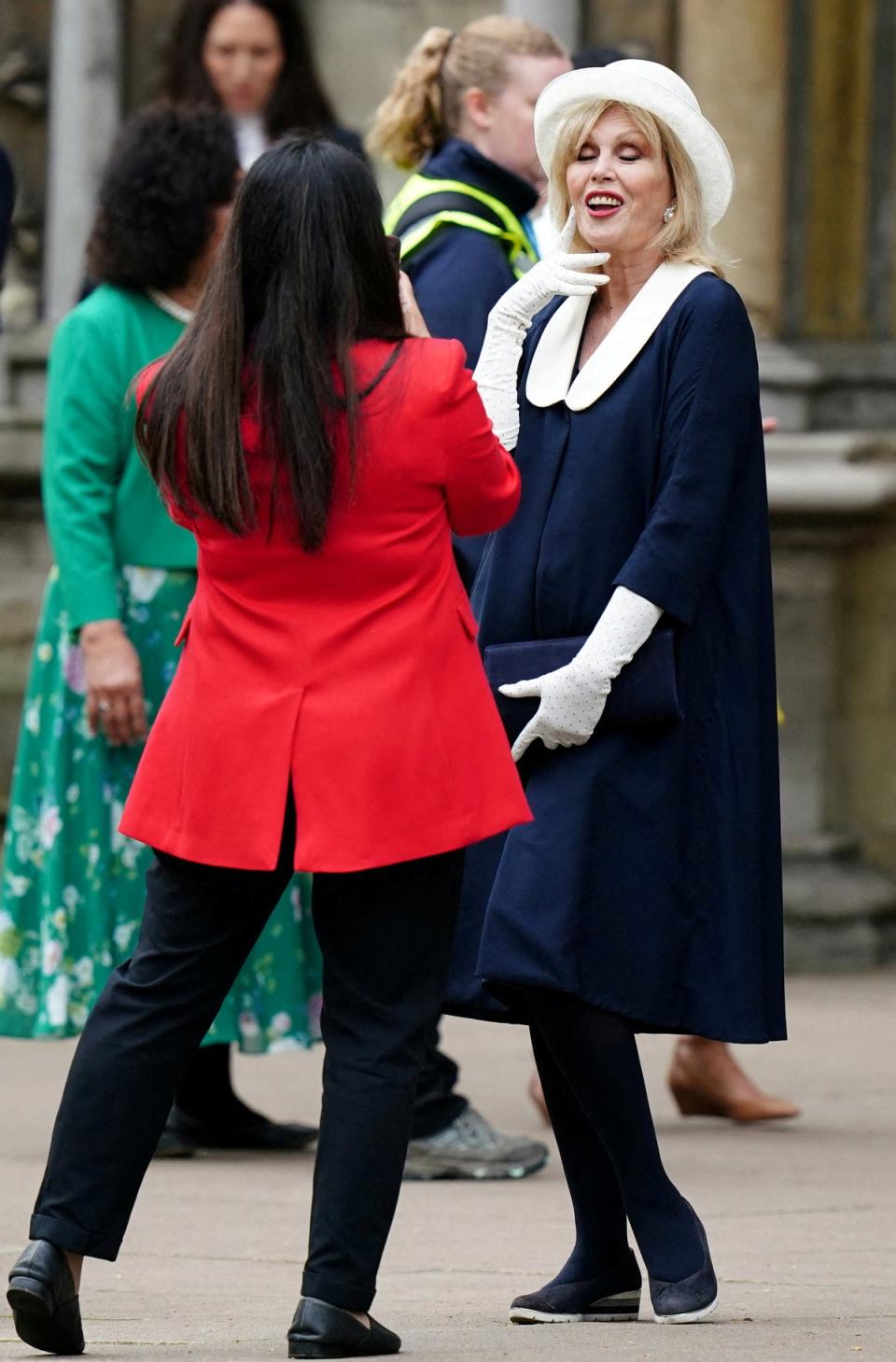 Lumley went for a navy blue and white outfit (REUTERS)