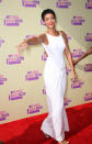 At the MTV Video Music Awards, Rihanna chose this backless, white gown created by designer Adam Selman.