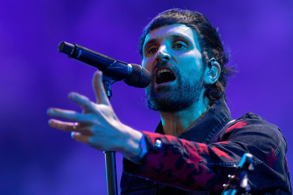 Sergio Pizzorno, lead vocalist of the British rock band Kasabian, performs during the Corona Capital music festival in Mexico City, Saturday, Nov. 18, 2023. (AP Photo/Alejandro Godinez)