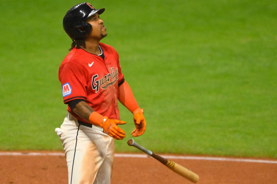 Cleveland Guardians slugger Jose Ramirez (11) watches his three-run home run in the eighth inning against the Cincinnati Reds on Wednesday in Cleveland.