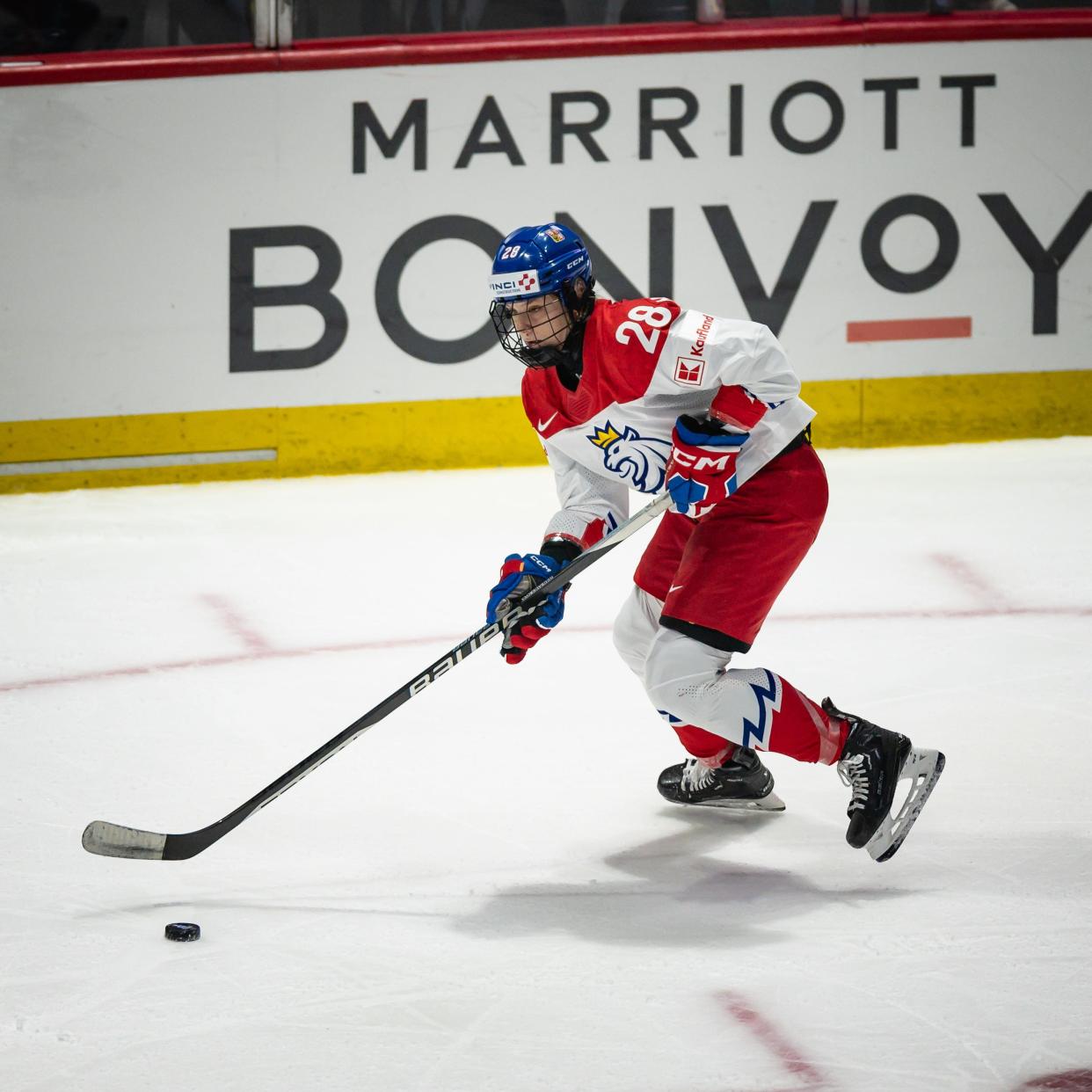 Czechia's Noemi Neubauerova, a 2022 graduate of Colgate University in Hamilton, controls the puck during a game with Canada in the International Ice Hockey Federation Women's World Championship at the Adirondack Bank Center in Utica, NY on Sunday, April 7, 2024.
