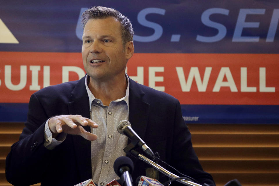 FILE- In this July 8, 2019 file photo, former Kansas Secretary of State Kris Kobach addresses the crowd as he announces his candidacy for the Republican nomination for the U.S. Senate in Leavenworth, Kan. Secretary of State Mike Pompeo said Tuesday, Jan. 7, 2020, that he'll remain in his post as the country's top diplomat, forgoing a run for Senate from Kansas that many Republicans have seen as the party's best hope of retaining what should be a guaranteed GOP seat from the deep red state. Without him, Washington Republicans worry that Kobach, a polarizing conservative who lost a race for governor last year, would become the GOP's Senate candidate and lose in the general election. (AP Photo/Charlie Riedel, File)