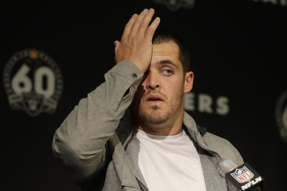 Oakland Raiders quarterback Derek Carr reacts at a news conference after an NFL football game against the Tennessee Titans in Oakland, Calif., Sunday, Dec. 8, 2019. (AP Photo/Ben Margot)