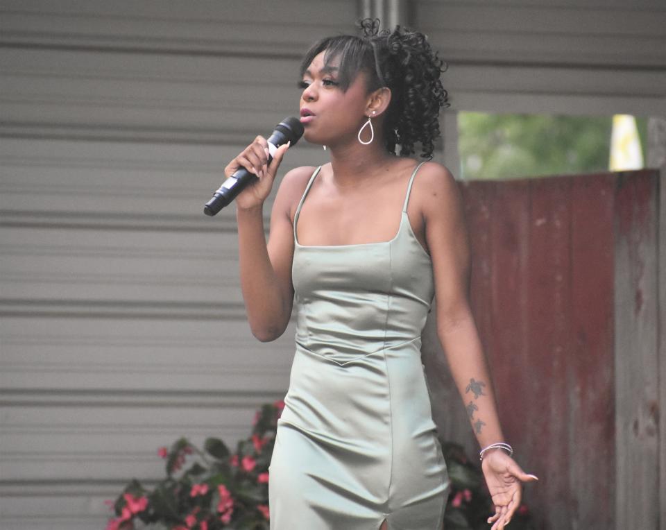 Abyona Freeman, second runner-up in Sunday's Lenawee County Fair queen's contest, sang the Whitney Houston song "Greatest Love of All" for her talent in the competition.