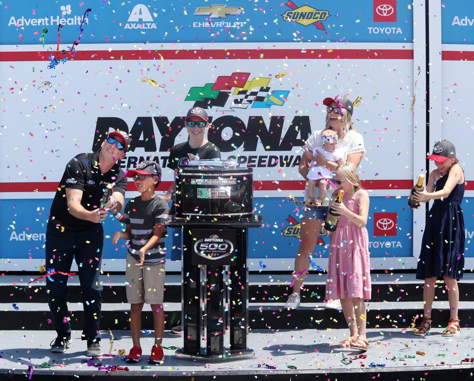 Confetti flies as Nascar surprises Michael McDowell winner of the 2021 Daytona 500 and familey with a celebration in Victory Lane, Saturday August 26, 2023 because in 2021 under Covid protocols the family wasn't here to celebrate the win with him.