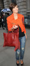 <b>London Fashion Week AW13 FROW </b><br><br>Frankie Sandford brightened up her LFW look with an orange biker jacket.<br><br>© Rex