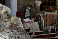 The Immaculate Concepcion Catholic church lies in ruins after an overnight earthquake in Guayanilla, Puerto Rico, Tuesday, Jan. 7, 2020. A 6.4-magnitude earthquake struck Puerto Rico before dawn on Tuesday, killing one man, injuring others and collapsing buildings in the southern part of the island. (AP Photo/Carlos Giusti)