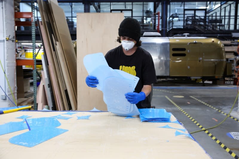 Workers at Bednark produce medical face shields, as the demand for their production rapidly increased