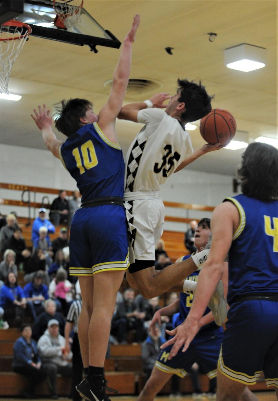 River View's Owen Emig tries to put a shot over Maysville's Coen Fink in a game last season. Emig and Brody Border will carry the load for the Black Bears, who have several new faces expected to contribute.