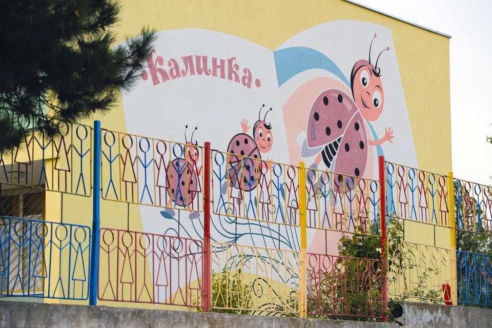 Ladybirds are painted on the wall of a kindergarten in a village on the outskirts of Burgas, Bulgaria, Monday, Sept. 28, 2020. Human rights activists and experts say local officials in several countries with significant Roma populations have used the pandemic to unlawfully target the minority group, which is Europe's largest and has faced centuries of severe discrimination. In Bulgaria, Roma communities were sprayed with disinfectant from crop dusters this spring as coronavirus cases surged in the country. (AP Photo/Vadim Ghirda)