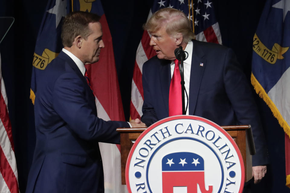 FILE - In this June 5, 2021, photo, former President Donald Trump, right, announces his endorsement of North Carolina Rep. Ted Budd, left, for the 2022 North Carolina U.S. Senate seat as he speaks at the North Carolina Republican Convention in Greenville, N.C. When Budd won a surprise endorsement from Trump last year, he was a little-known congressman running for a Senate seat in North Carolina against some of the state's most recognizable Republicans, including a former governor. (AP Photo/Chris Seward, File)