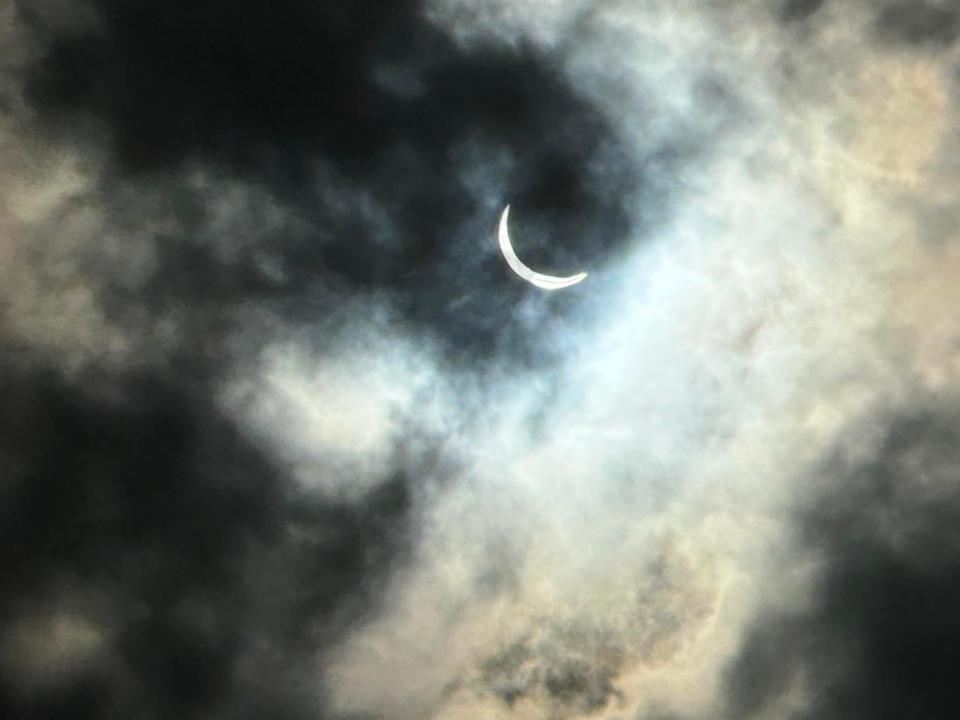 A solar eclipse image captured by Richie Blick in Berryville, Virginia on April 8, 2024. "The images I took during cloud cover have a bluish hue," Blick said.