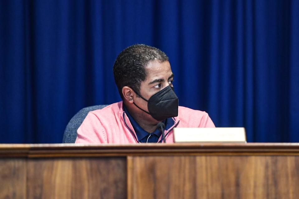 Asheville City Schools board member James Carter listened to parents speak during a meeting on December 7, 2021.