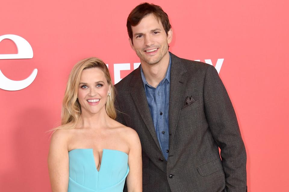 Reese Witherspoon and Ashton Kutcher arrives for the World Premiere Of Netflix's "Your Place Or Mine" held at Regency Village Theatre on February 02, 2023 in Los Angeles, California.