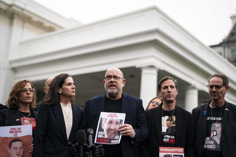 Jonathan Dekel-Chen, father of Sagui Dekel-Chen, speaks to members of the media following a meeting with U.S. President Joe Biden and the families of Americans who were taken hostage by Hamas, at the White House in Washington, D.C., on Wednesday. Photo by Al Drago/UPI