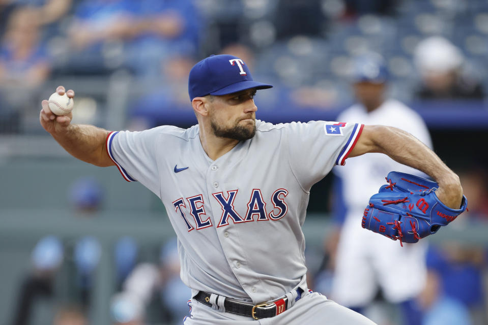 Texas Rangers pitcher Nathan Eovaldi delivers to a Kansas City Royals batter during the first inning of a baseball game in Kansas City, Mo., Tuesday, April 18, 2023. (AP Photo/Colin E. Braley)