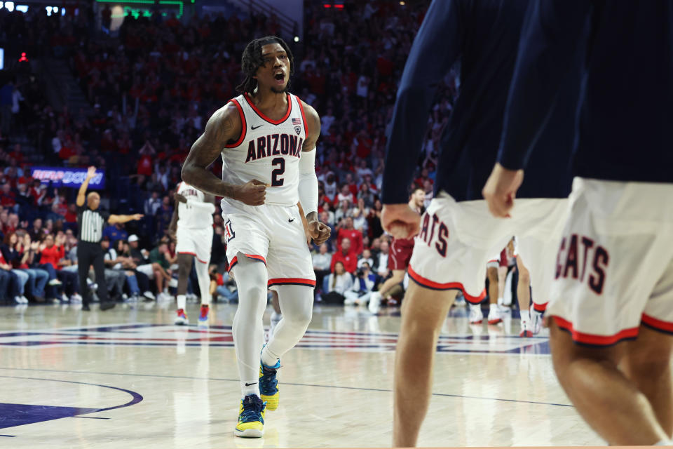 Dec 2, 2023; Tucson, Arizona, USA; Arizona Wildcats guard <a class="link " href="https://sports.yahoo.com/ncaab/players/204653" data-i13n="sec:content-canvas;subsec:anchor_text;elm:context_link" data-ylk="slk:Caleb Love;sec:content-canvas;subsec:anchor_text;elm:context_link;itc:0">Caleb Love</a> (2) celebrates a basket against the Colgate Raiders during the first half at McKale Center. Mandatory Credit: Zachary BonDurant-USA TODAY Sports